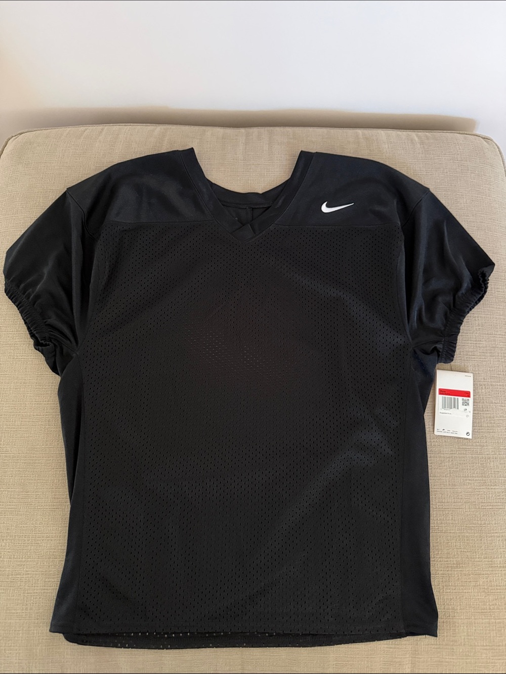 Nike Men’s Black Mesh Athletic Jersey with White Swoosh